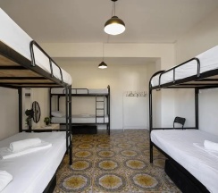 Кровать в общем номере в White Hostel