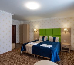 Четырехместный номер высшей категории в Сказка снежных вершин