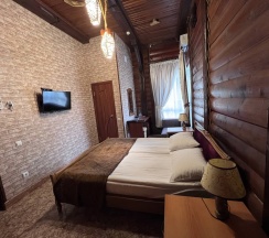 Двухместный номер категории "Супериор-Ракни" с двуспальной кроватью, с возможностью одного дополнительного места. в Викинг