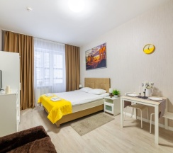 Улучшенная студия с кроватью king size и балконом в Pulkovo Apart