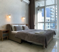 Трехместная студия с кухней на 10 этаже в Ольгинке в Метрикс Девелопмент