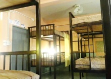 Кровать в общем номере в Jinda Hostel