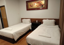 Двухместный номер Standard 2 отдельные кровати в Longzhu Guesthouse