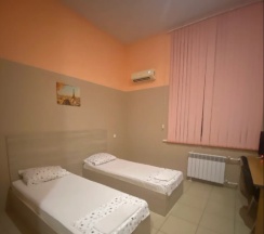 Номер эконом с 4 односпальными кроватями в Рамhotel