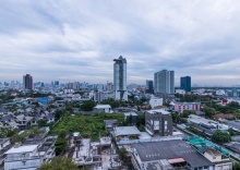 Номер Deluxe с 2 комнатами с балконом 2 отдельные кровати в Chatrium Residence Sathorn