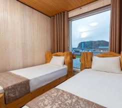 Улучшенный четырехместный номер в Сияние Севера