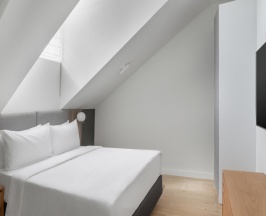 Пятиместные апартаменты Мансарда с 2 комнатами в The Basilian Minsk, Curio Collection by Hilton