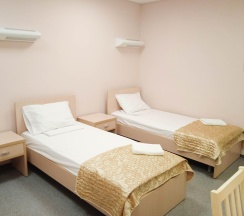 Кровать в 3-местном общем номере в Smart Hotel KDO Тюмень