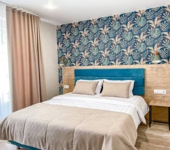 Стандарт семейный улучшенный с балконом в Volna Family Resort