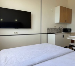 Уютная студия на 13 этаже с панорамным видом на Каспийское море. в Как Дома 05