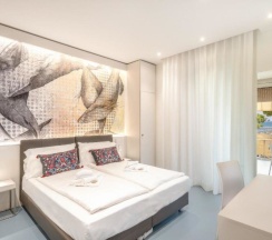 Двухместный номер Deluxe с частичным видом на море двуспальная кровать в Hotel Le Lampare