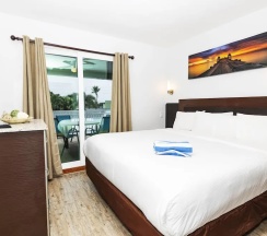 Двухместный люкс двуспальная кровать в Caribbean Resort Suites