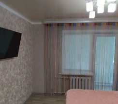 Апартаменты с 2 комнатами с балконом и с красивым видом из окна в Зима