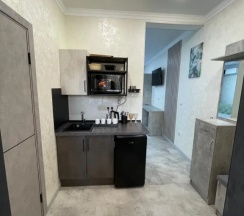 Двухместный номер Standard с балконом двуспальная кровать в Гостевой дом на Октябрьской