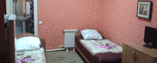 Кровать в общем номере в Визит