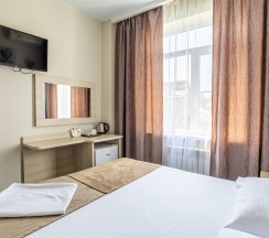 Cтандартный номер с двуспальной кроватью в Мартон Шолохова