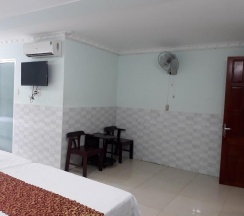 Кровать в общем номере в Gold Hotel
