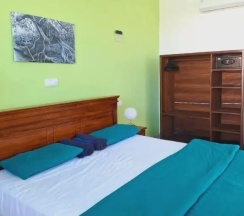Двухместный номер с видом на сад двуспальная кровать в Jaga Bay Resort