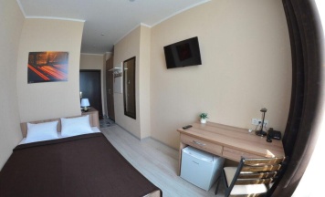 Номер стандарт улучшенный с 1 двуспальной кроватью в Сервисный пункт