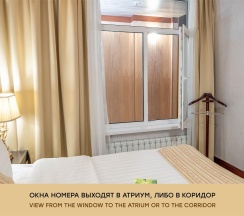 Бюджетный двухместный номер с видом на атриум в Гранд мандарин