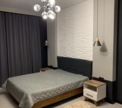 2-комнатные апартаменты стандарт с 1 двуспальной кроватью и диваном в Apart Ru Hotel