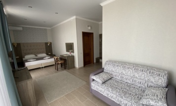 Джуниор Сюит с боковым видом на море в Amore