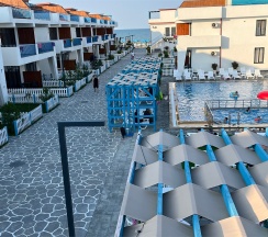 Двухуровневый ПОЛУЛЮКС с зоной отдыха на крыше в Santorini Family Club