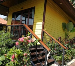 Двухместное бунгало с видом на сад двуспальная кровать в Ricci House Resort