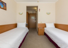 Номер стандарт с 2 односпальными кроватями в AZIMUT Сити Отель Уфа