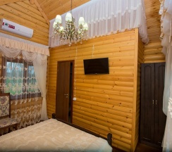 Номер люкс свадебный с 1 двуспальной кроватью в Кирьянов