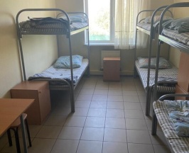 Кровать в общем номере в Чкалофф