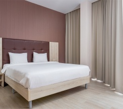 Апартаменты Панорама с кроватью King Size и кухней в Golden Tulip