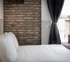 Двухместный номер Superior с балконом двуспальная кровать в Arch Rome Suites