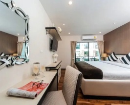 Двухместная студия с видом на бассейн двуспальная кровать в The Title KR Beach Condotel Rawai Phuket