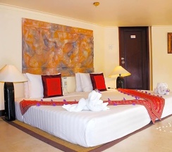 Двухместное бунгало Deluxe с видом на сад двуспальная кровать в Poshanu Resort