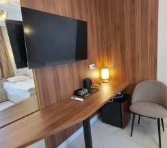 Улучшенный номер с двумя односпальными или двуспальной кроватью в Владимирский