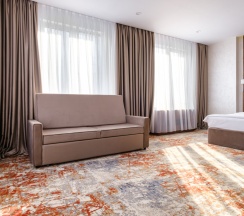 Двухместный люкс с видом на горы двуспальная кровать в GRAND MILDOM HOTEL