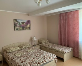 Четырехместный номер с 1 двуспальной или 2 односпальными кроватями в Танго