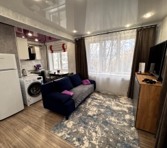 Студия в Квартира Аврора северное сияние за окном