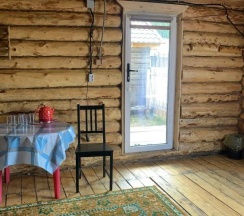 Коттедж улучшенный с 2 односпальными и 1 двуспальной кроватью в Аура Алтая