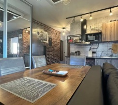 Апартаменты c 1 комнатой с балконом и с видом на город в Квартира в центре Loft