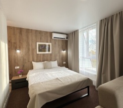 Люкс номер с 1 двухспальной кроватью + 2 спальных места в Veranda