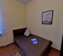 Кровать в 2-местном общем номере в Курилотрансавто