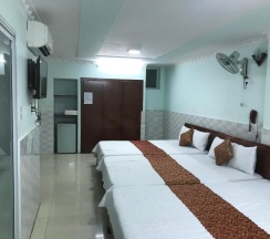 Кровать в общем номере в Gold Hotel