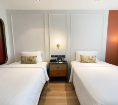 Двухместный семейный номер Standard 2 отдельные кровати в A-One Bangkok Hotel
