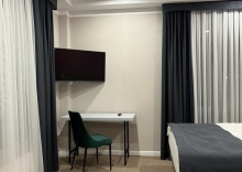 Люкс с красивым видом из окна в Graf Hotel Shymkent