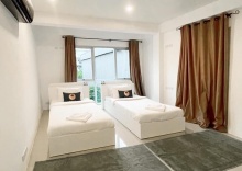 Двухместный номер Standard 2 отдельные кровати в RoomQuest Bangkok Sukhumvit 50