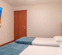 Люкс с одной большой или двумя односпальными кроватями в Энергетик