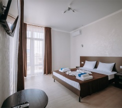 Улучшенный люкс с видом на море (изолированные комнаты) в Космос