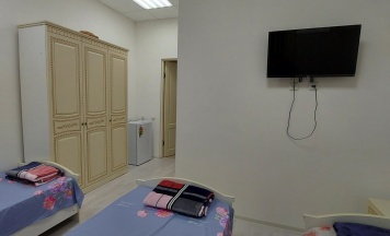 Кровать в 3-местном общем номере в Беной Тревел